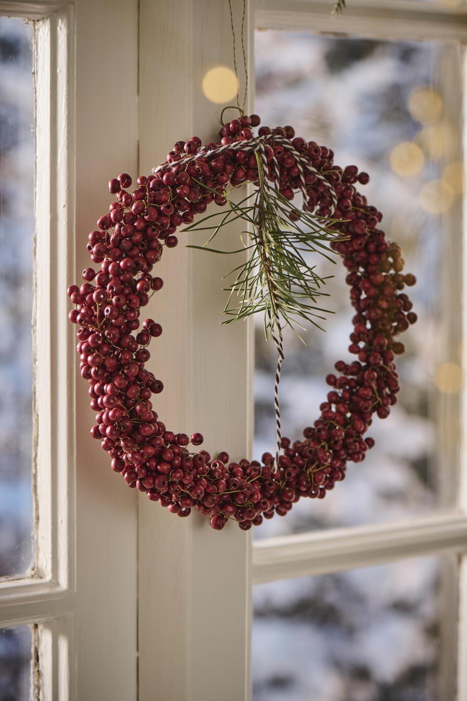 Kranz aus Holzperlen