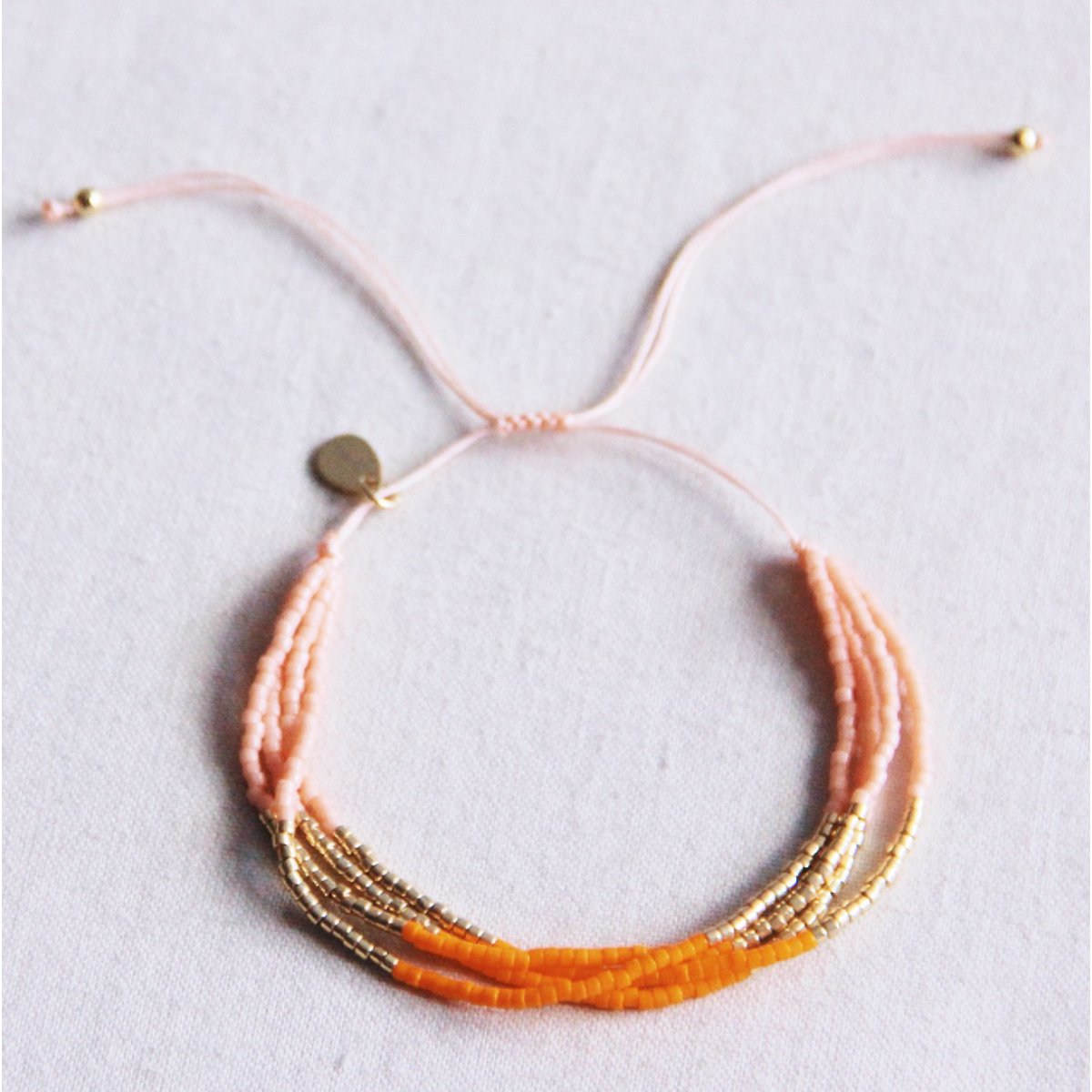 Miyuki -Armband Quadruple - Lachs/Orange/Goldplatte